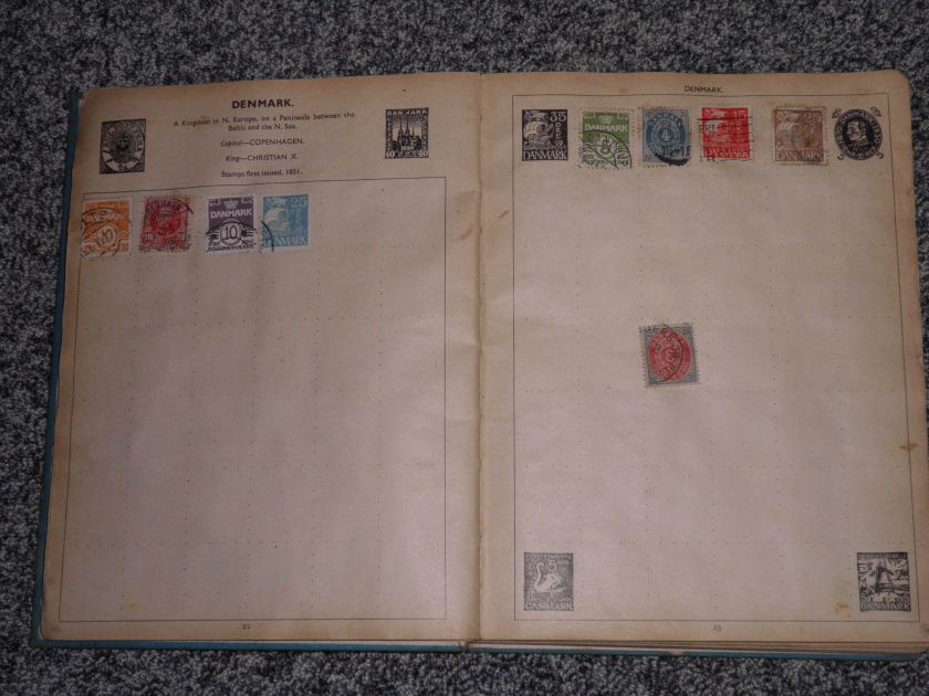 L89   A OLD IMPROVED POSTAGE STAMP ALBUM WITH EARLY MID ALL WORLD 