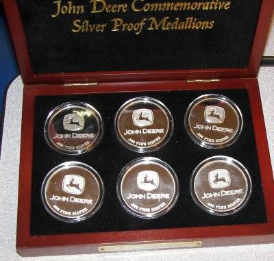 John Deere 1 oz .999 Silver proof commemorative Medallions in wood 