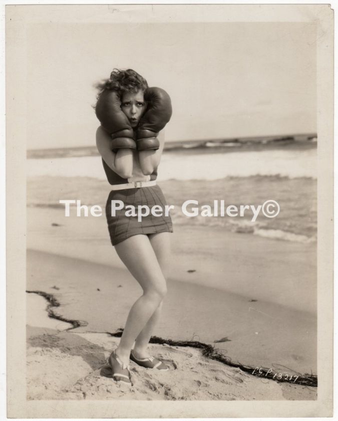 Photograph of Clara Bow in a Swimsuit and Boxing Gloves on the Beach 