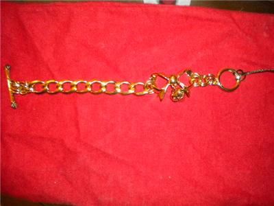 High shine, starter charm bracelet by Juicy Couture, featuring a T bar 
