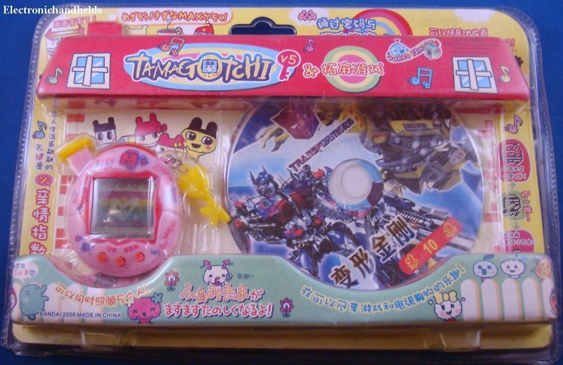 RARE BANDAI TAMAGOTCHI TRANSFORMERS VIRTUAL PET NEW +CD  