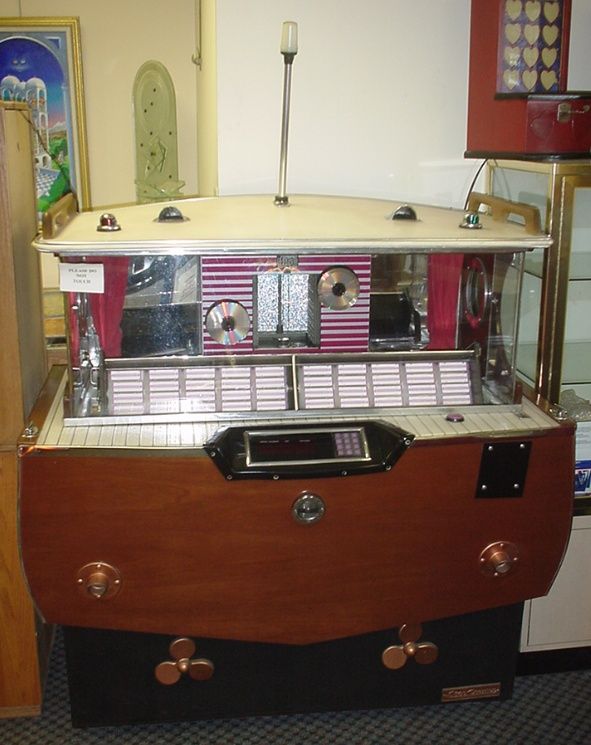   HIGH QUALITY JUKEBOXES, SLOTMACHINES, ART DECO catalin RADIOS  