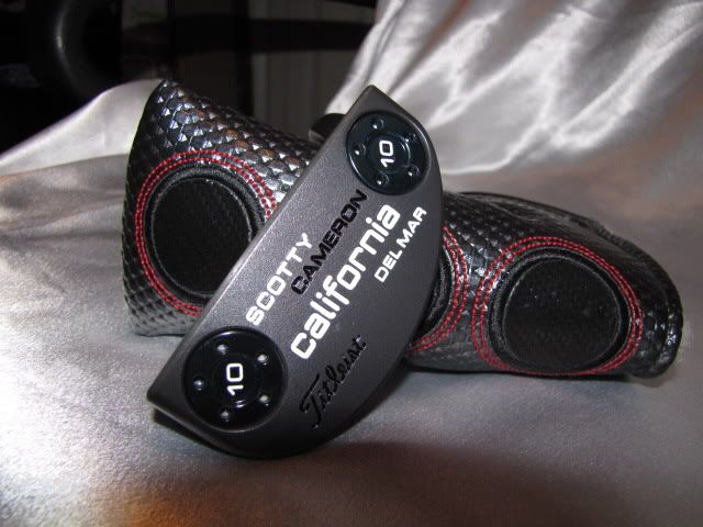 this putter has the custom satin semi gloss graphite finish that was 