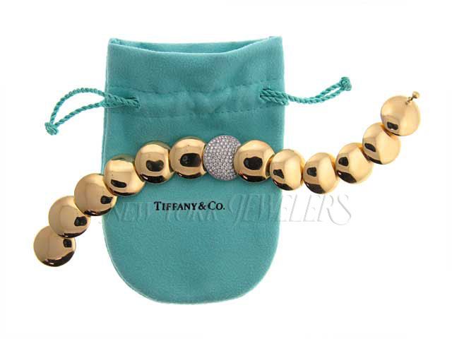 TIFFANY & CO. PLAT/18KT DIAMOND DISC BRACELET .62 G/VS  